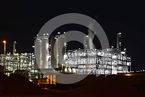 Chemical industry plant at night - building of a factory for the