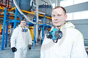 Chemical industry workers at factory