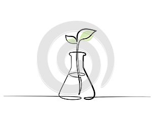 Chemical lab retort with sprout of plant