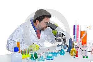 Chemical laboratory scientist man looking microscope