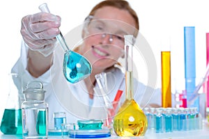Chemical laboratory scientist woman with glass flask