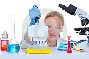 Chemical laboratory scientist woman multi channel pipette