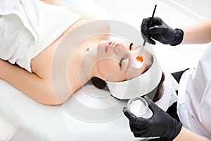 Chemical medical facial peel for getting rid of wrinkles and pimples.