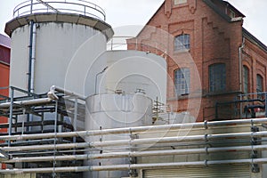 Chemical plant with modern production and old brick factory building