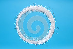 Chemical plant urea fertilizer on blue background