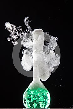 Chemical reaction in volumetric flask glass in labolatory
