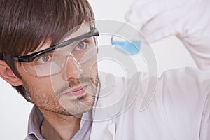 Chemical researcher with flask