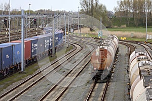 Chemical tank wagons for cargo trains stored at train station Lage Zwaluwe