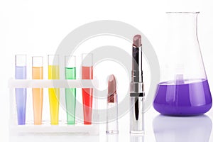 Chemical test tubes and lipstick. harmful