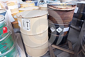 Chemical waste dumped in rusty barrels