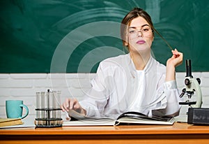 Chemist biologist with microscope. Smart student. Study hard. Education concept. Woman pretty adorable teacher or