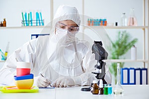 The chemist checking and testing plastic dishes