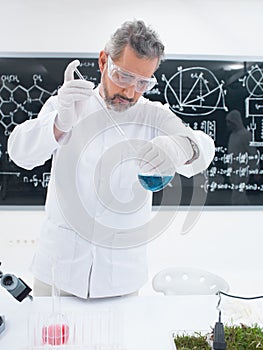 Chemist conducting lab experiment