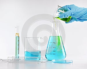 Chemist formulating dangerous solution substances, Scientist with equipment and science experiments.