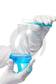 Chemist hands in protective gloves mixed substance