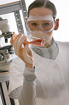 Chemist holding flask