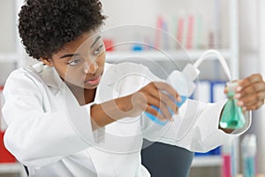 chemist student during experiment