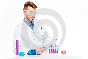 Chemist using tablet computer