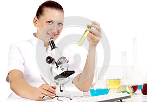 Chemist woman with test tubes