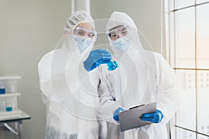 Chemist working for research and testing in laboratory together,Covid-19,Coronavirus vaccine