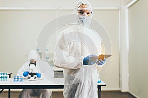 Chemist working for research and testing in laboratory together,Covid-19,Coronavirus vaccine