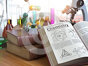 Chemistry education concept. Open books with text chemistry and