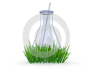 Chemistry flasks on grass