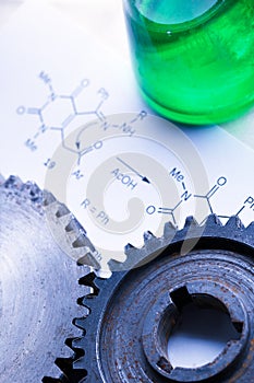 Chemistry formula with green flask