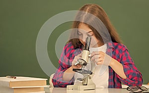 chemistry laboratory. research education. future scientist kid with scope.