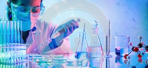 Chemistry Laboratory - Woman With Pipettes photo