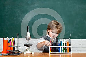 Chemistry lesson. School chemistry lessons. First grade. Little children at school lesson. Education. Back to school and