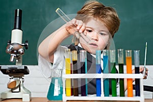Chemistry science. September 1. Preschooler. Back to school. Science and education concept. Child from elementary school
