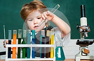 Chemistry science. September 1. Preschooler. Back to school. Science and education concept. Child from elementary school