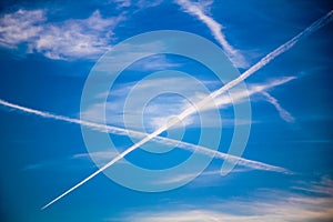 Chemtrails on Blue Sky photo