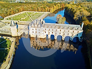 CHENONCEAU, FRANCE - NOVEMBER 6, 2021: Aerial drone view of French Castle of Chenonceau and its gardens on Cher River, France