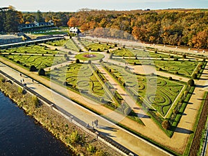 CHENONCEAU, FRANCE - NOVEMBER 6, 2021: Aerial drone view of French Castle of Chenonceau and its gardens on Cher River, France