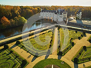 CHENONCEAU, FRANCE - NOVEMBER 6, 2021: Aerial drone view of French Castle of Chenonceau and its gardens on Cher River, France