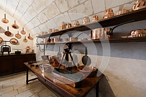 Indoor view of the Chenonceau Castle, ChÃÂ¢teau de Chenonceau, inside the kitchen with many silver pots