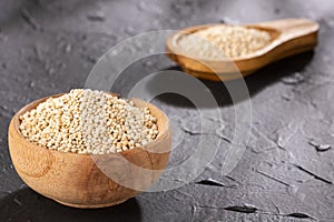 Chenopodium quinoa - Organic quinoa seeds in the wooden bowl