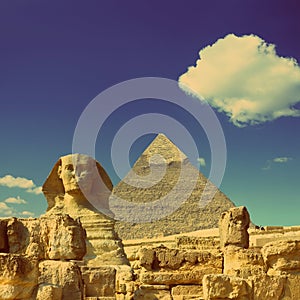 Cheops pyramid and sphinx in Egypt - vintage retro style