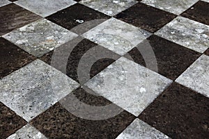 Chequered paving slabs