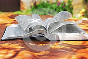 Chernihiv, Ukraine - May 27, 2019: An open Bible on the table. The book of life