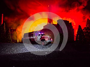 Chernobyl nuclear power plant at night. Layout of Chernobyl station during nuclear reactor explosion. Fire fighters at work.