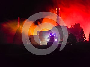 Chernobyl nuclear power plant at night. Layout of Chernobyl station during nuclear reactor explosion. Fire fighters at work.