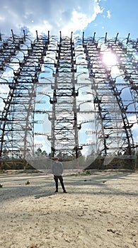 Chernobyl - A young man standing under Secret Soviet Radar `DUGA-1`