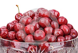 Cherries in a bowl. isolated on white background