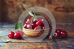 Cherries in a bowl on a wooden table