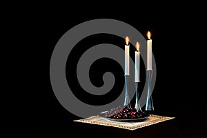 Cherries and candles in steel