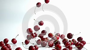 cherries falling in slow motion