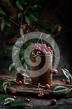 Cherries in a jar on the table